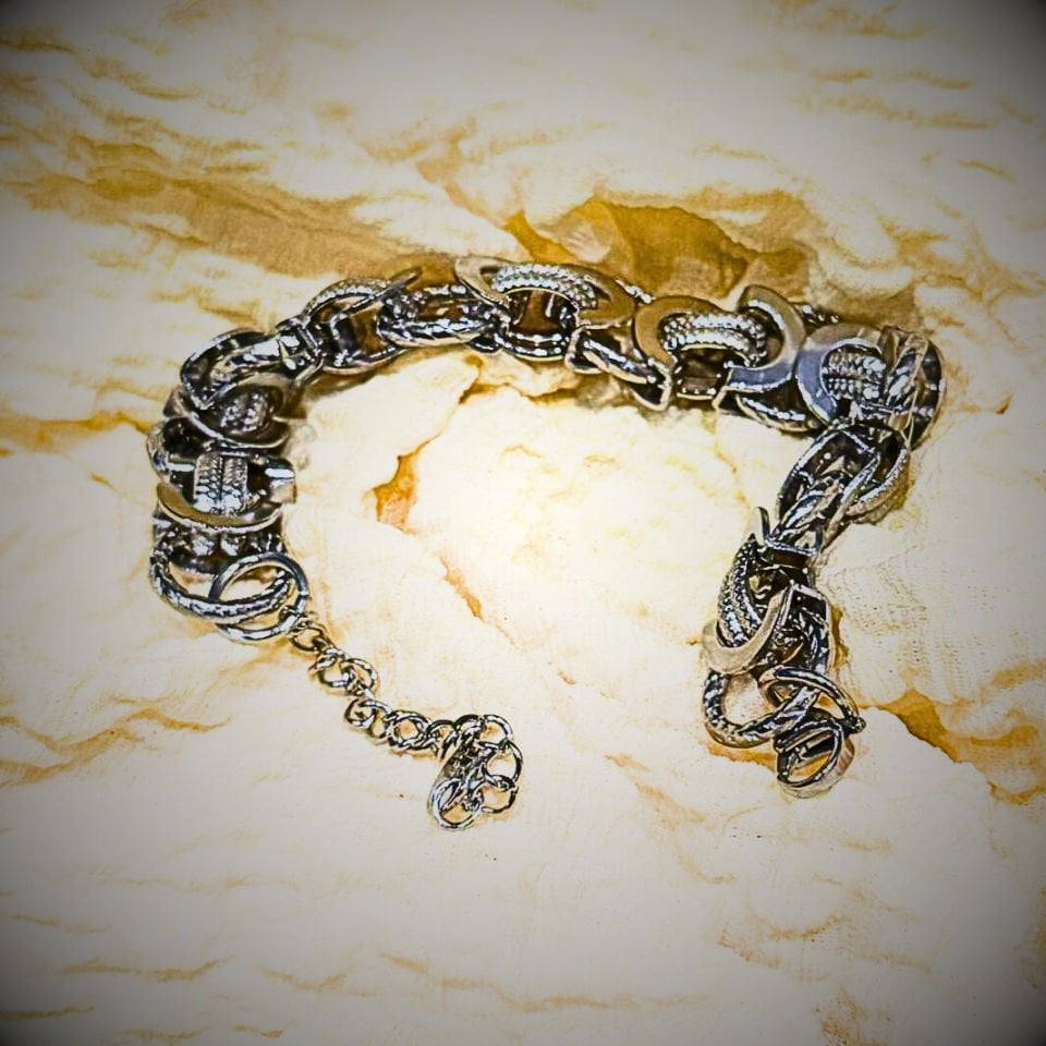 Gümüş renkli zincir detaylı çelik bilezik