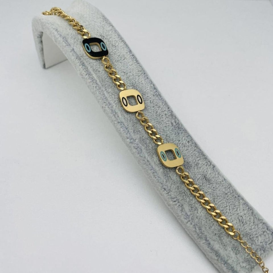 Altın renkli çelik bilezik